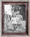 Rustic picture frame holding family photo